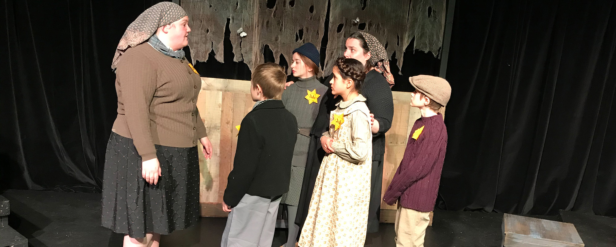 Stage production with children about the Holocaust